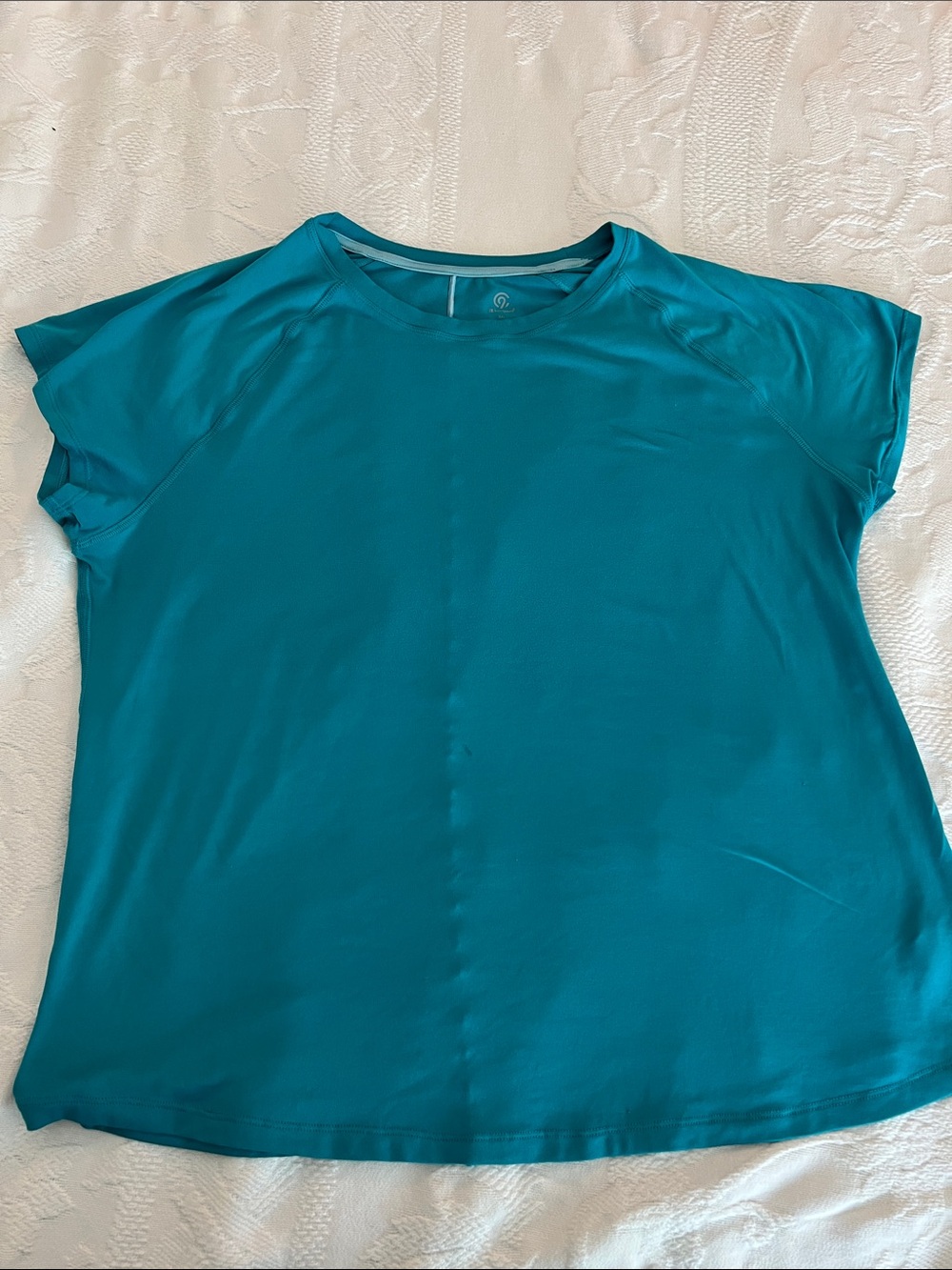 Champion Teal Short Sleeve Athletic Tee or swim top.